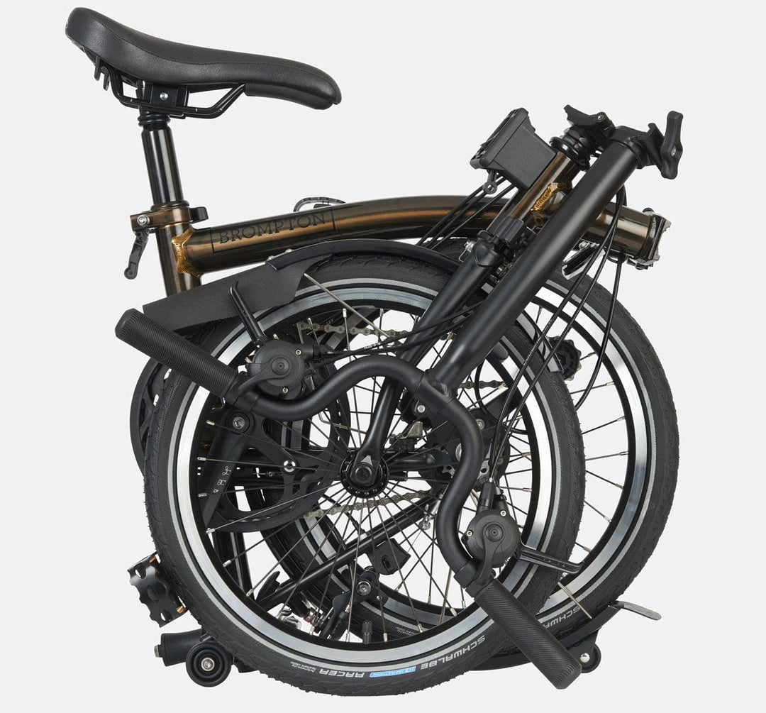 2023 Brompton C Line Explore Mid Handlebar 6-speed folding bike in Black Lacquer - folded