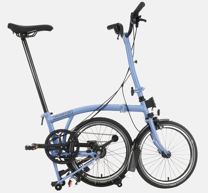 Brompton C Line Urban High Handlebar 2-speed folding bike in Cloud Blue - kickstand mode