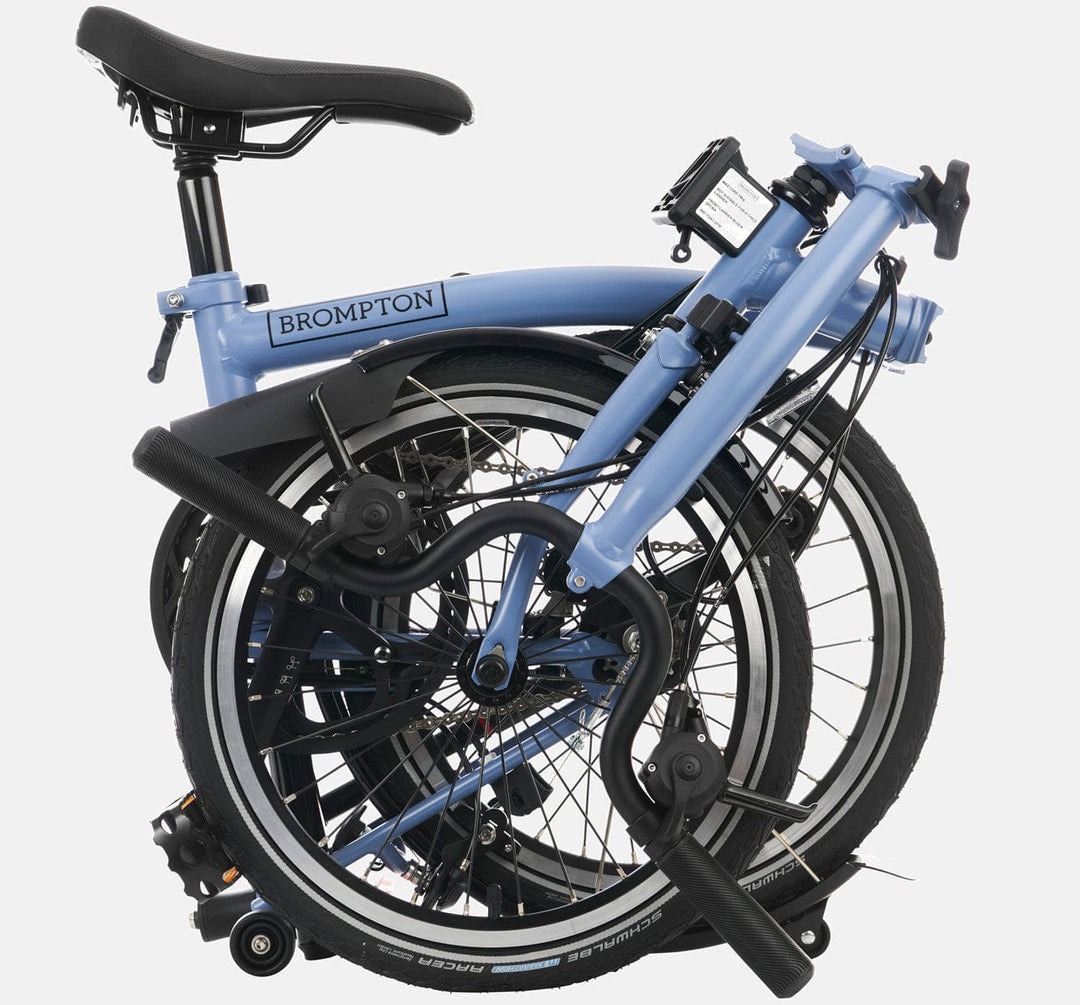 2023 Brompton C Line Urban Mid Handlebar 2-speed folding bike in Cloud Blue - folded