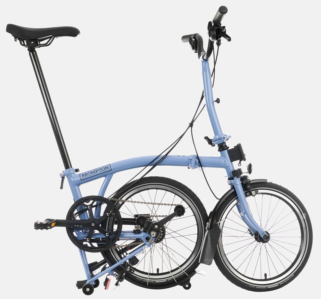 2023 Brompton C Line Explore Mid Handlebar 6-speed folding bike in Cloud Blue - kickstand mode