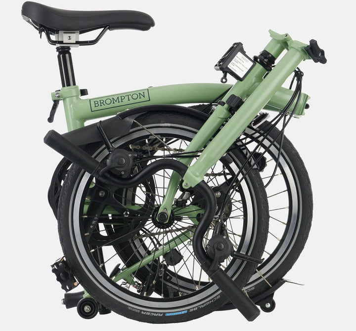 Brompton C Line Urban High Handlebar 2-speed folding bike in Matcha Green - folded