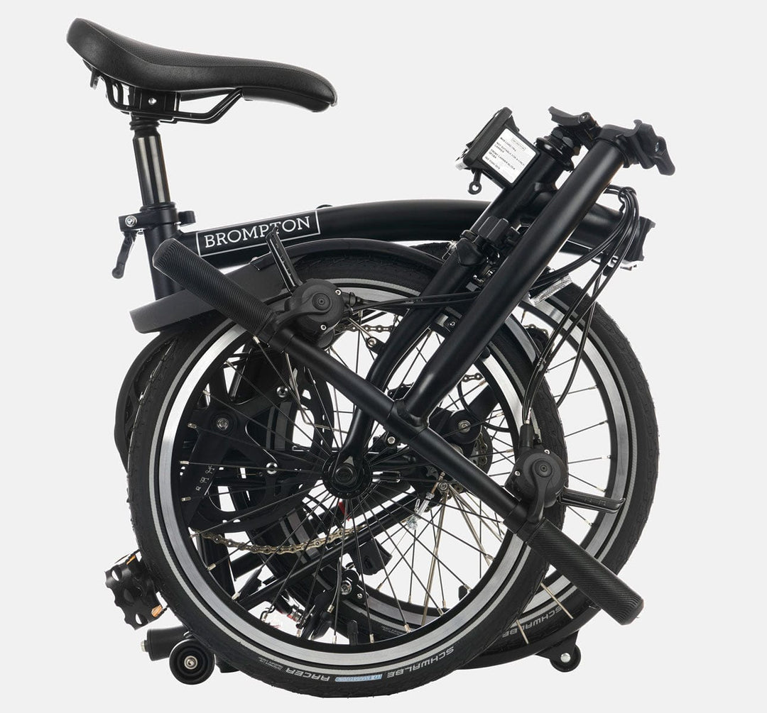 2023 Brompton C Line Explore Low Handlebar 6-speed folding bike in Matte Black - folded