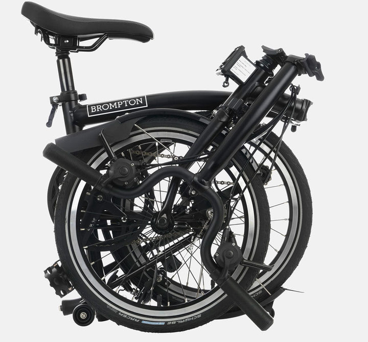 2023 Brompton C Line Explore Mid Handlebar 6 speed folding bike in Matte Black - folded